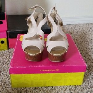 Lightly used nude wedge